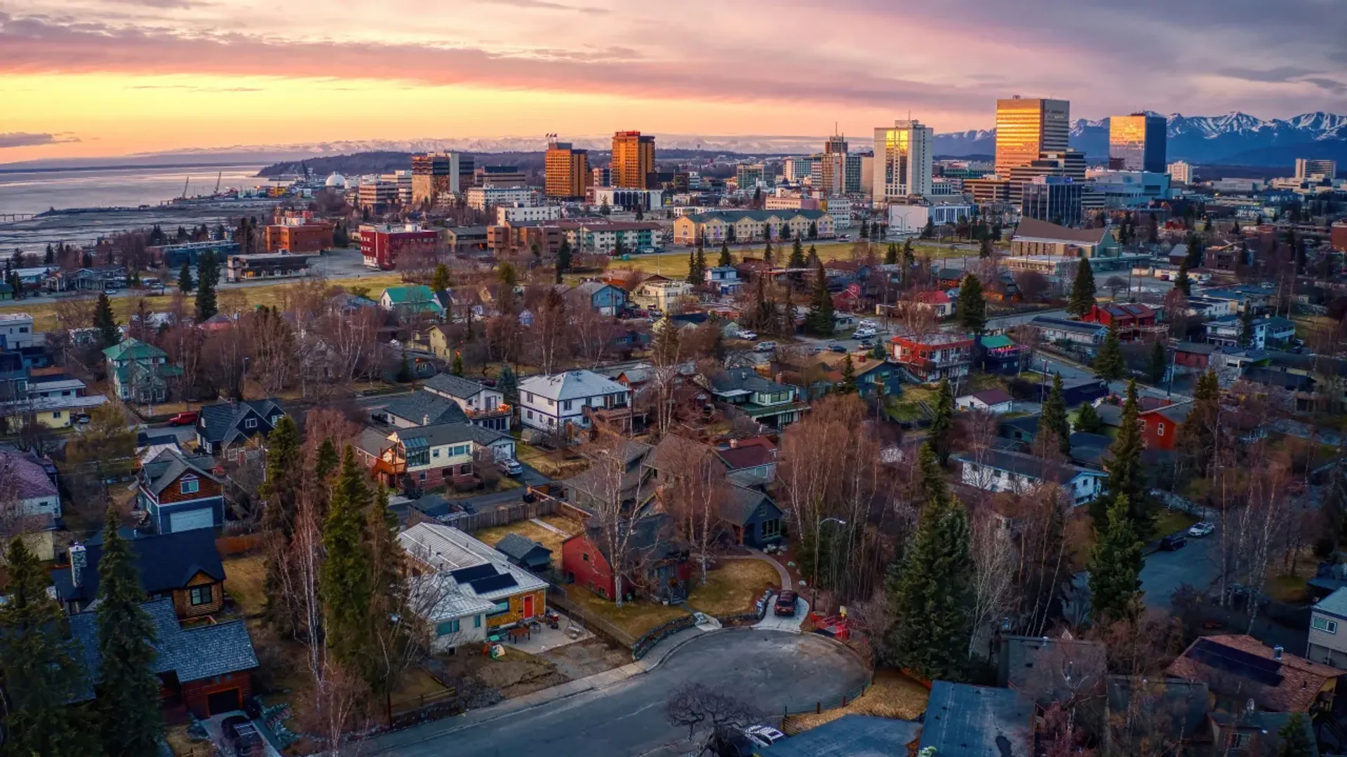 Aerial view of a sunset over downtown Anchorage, Alaska.